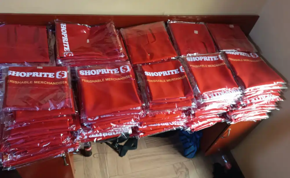 bulk uniform production by garment factory in Lagos for Shoprite staff merchandise neatly packaged